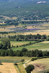 Fototapeta na wymiar Patchwork of Farmer's fields in valley below Sault, Provence France