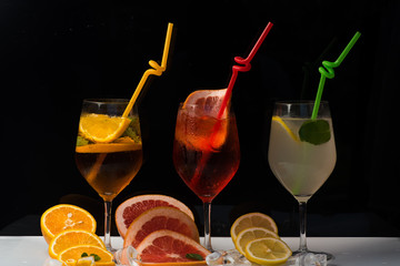 Fruit slice and cocktail glass at bar.