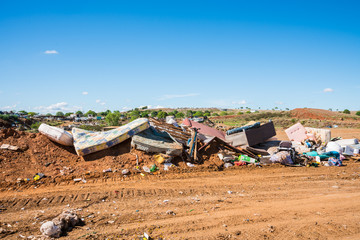 Household rubbish at town refuse site in rural area