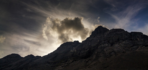 Fototapeta premium Top mountain Khibiny in the form of a background of the cloudy sky.