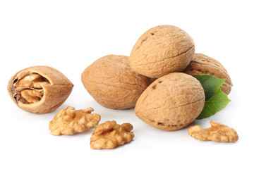 Green walnuts with leaves isolated on a white background