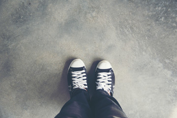 Life is journey, Black sneaker on the grasses. Travel Concept.