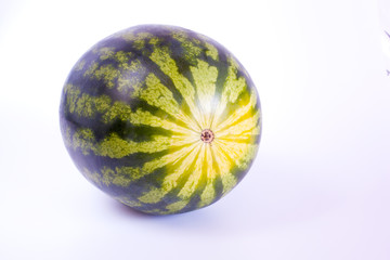 whole watermelon side view on white background