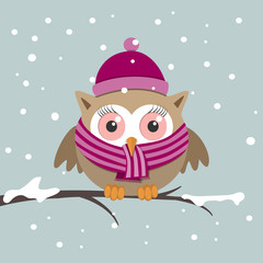 Female owl with scarf on a winter day