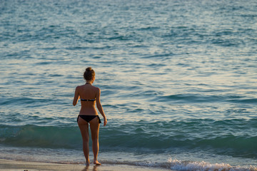 Classy woman on the beach