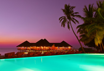 Pool and cafe on tropical Maldives island