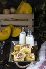 fresh pumpkin cinnabon buns with cinnamon and frosting