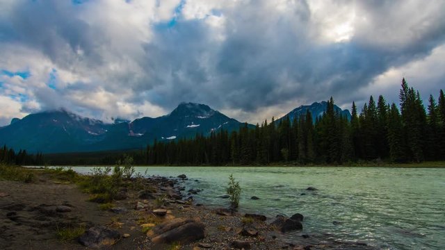 river in Canada time lapse with clouds and mountains 