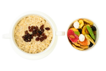 Health and Fitness food. Oatmeal porridge with berries and dried fruits