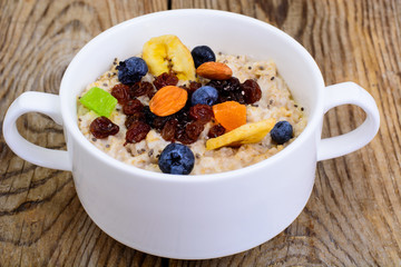 Porridge from oatmeal for breakfast