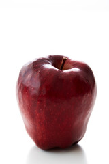 Fototapeta na wymiar Red ripe apple isolated on white