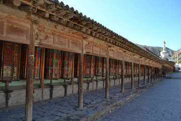 Fototapeta na wymiar The Tibetan kora or pilgrimage and prayer wheels in Xiahe (Labrang), Amdo Tibet