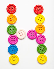 Sewing button alphabet: H