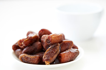 Dried Dates Fruits on dish white background