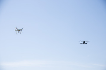 Two flying drones
