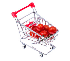 Ripe red cherry tomatoes in small cart