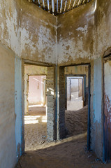 Ruins of once prosperous German mining town Kolmanskop in the Namib desert near Luderitz, Namibia, Southern Africa