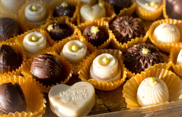 small handmade cakes in paper baskets 