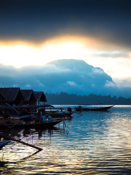 Fishing boat in the river Among the mountains