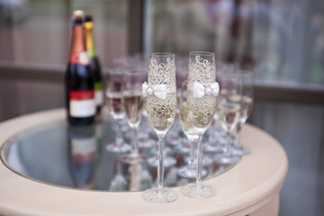 Champagne bottles and glasses in a wedding decoration