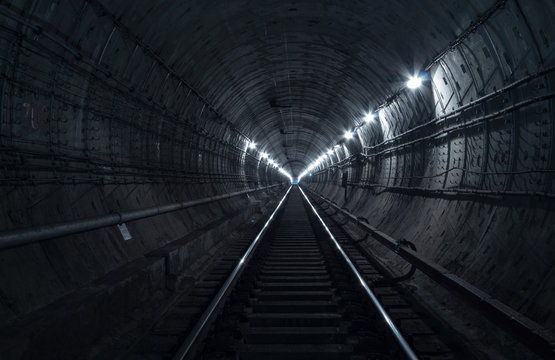 Underground tunnel. Rail way in a subway tunnel. 