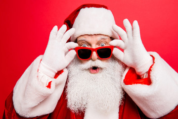 Omg! Increadible unbelievable crazy december surprise travel trips time! Holly jolly x mas noel! Closeup of aged excited astonished tourist santa with wide open eyes, mouth, adjusting eye wear