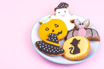 Halloween gingerbread on bright pastel color