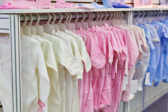 Rompers and bodysuits for newborns in store