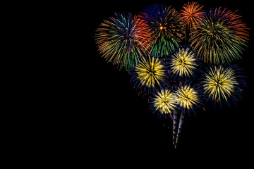 Colorful fireworks on black background.