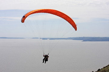 paraglider above the coast of Wales