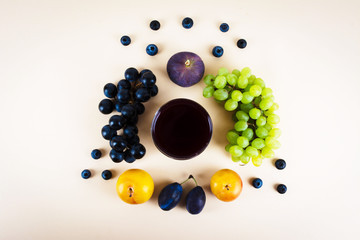 Grape juice with autumn seasonal fruits.