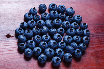 sweet blueberry on the brown table close up