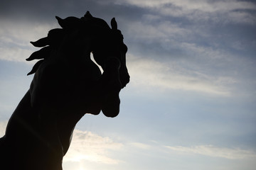 A horse sculpture near Orsay Museum in Paris - obrazy, fototapety, plakaty