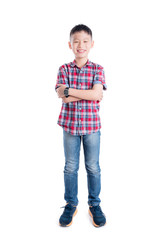 Full length of young asian boy smiling over white background