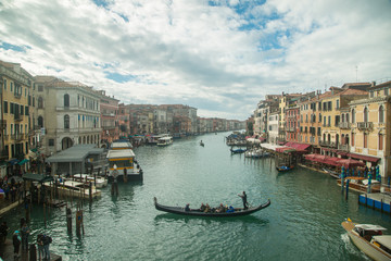 Fototapeta na wymiar Venice gondola boat transport customer visit