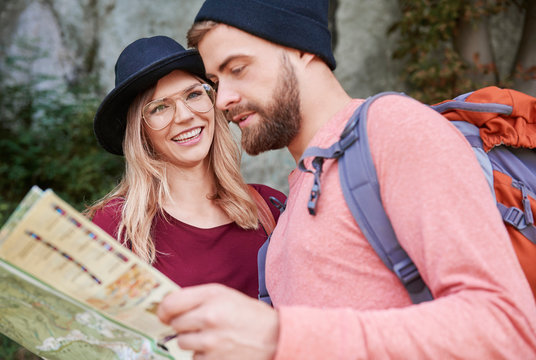 Couple looking at map, Krakow, Malopolskie, Poland, Europe