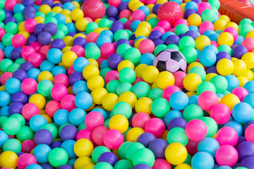 Fototapeta na wymiar colorful balls in playground ball pool in indoor play center