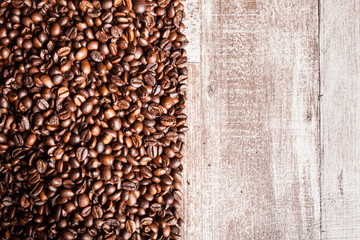 Coffee beans in close up photo. Refreshing moring drink
