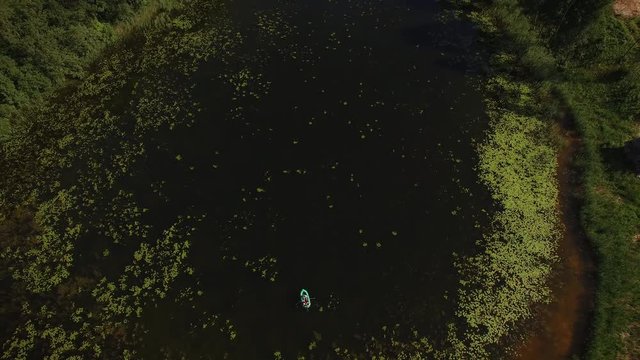 4k Aerial in Latvia above Lake and Boat