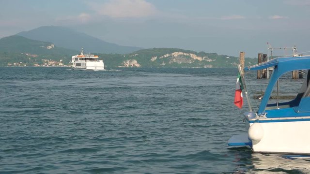 Lake Maggiore tourist boat. Italy in summer, beautiful view.