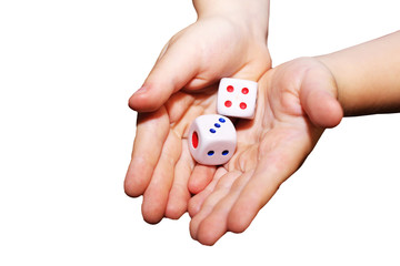 A hand with a pair of dice