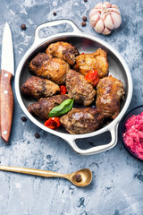 beef roulades in a metal bowl