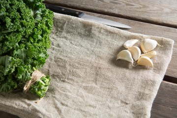 Kale leaves with garlic on napkin 