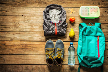 Traveling - packing (preparing) for adventure trip concept