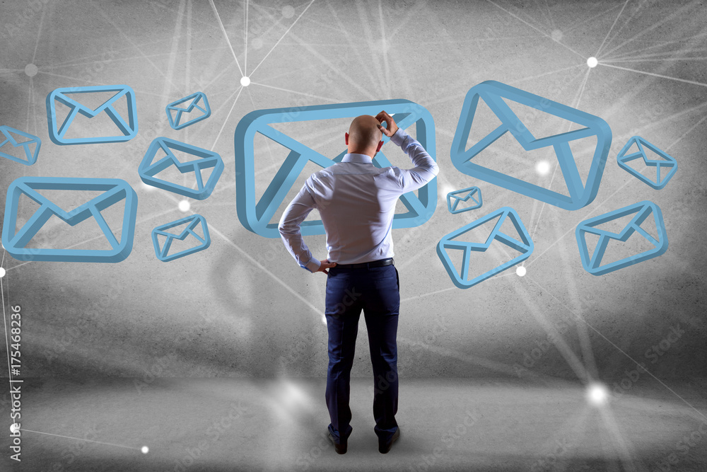 Poster businessman in front of a wall with blue email symbol displayed on a futuristic interface - message 