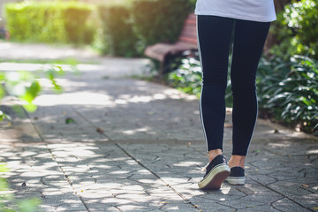 Fototapeta premium Woman exercising in the park