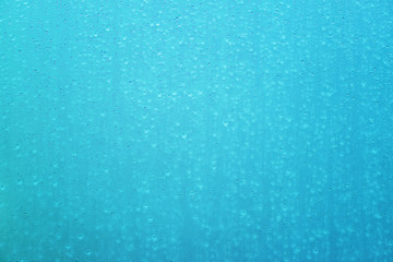 Wet glass surface as background