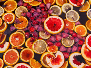 Sangria (Sbiten) Punch Drink homemade mulled wine with orange and lemon slices, strawberries, cinnamon and anise