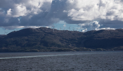 Wind turbines landscape  on the see shore

