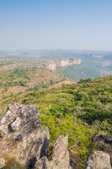 Landscape shot of beautiful Doucki Canyon in the Fouta Djalon highlands during Harmattan season, Guinea, West Africa - obrazy, fototapety, plakaty